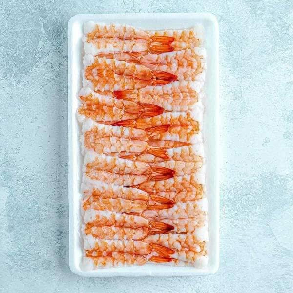 Cooked and peeled butterfly prawns